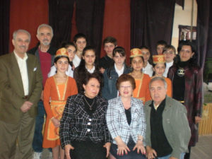 school3 Maro Bedrosian, seated center, with Karabagh School Principal Anahid Kossagyan, Detroit ADL Chairman Hagop Alexanian, students and guests