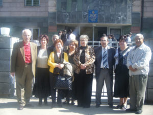 school5 Principal of Vahan Tekeyan School of Gumri, Hovhannes Bedrosian (third from right), is surrounded by guests at the entrance of the school.